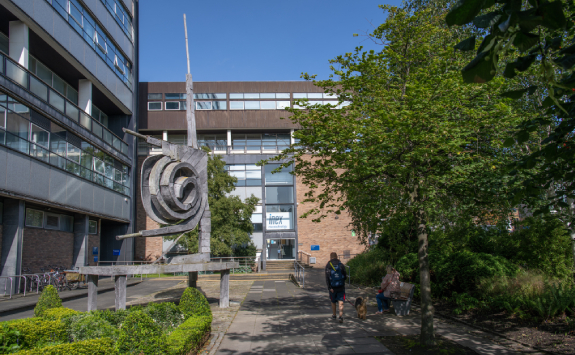 A detail of Spiral Nebula by Geoffrey Clarke in front of the Herschel Building. The aluminium sculpture follows a spiral pattern